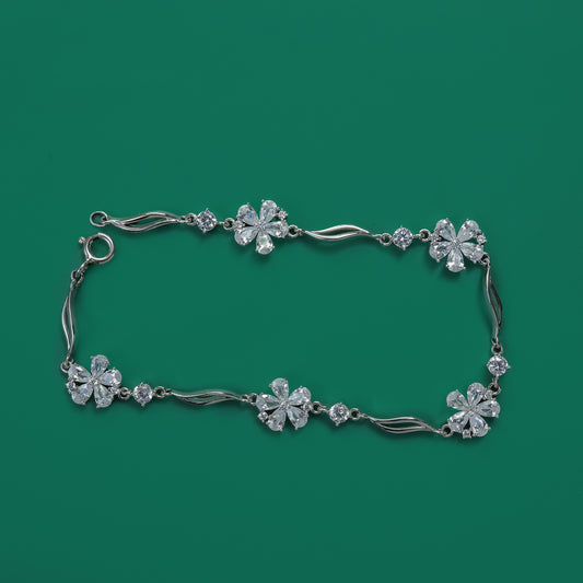 Bloom Shine Bracelet – Floral Zircon Elegance in 925 Silver