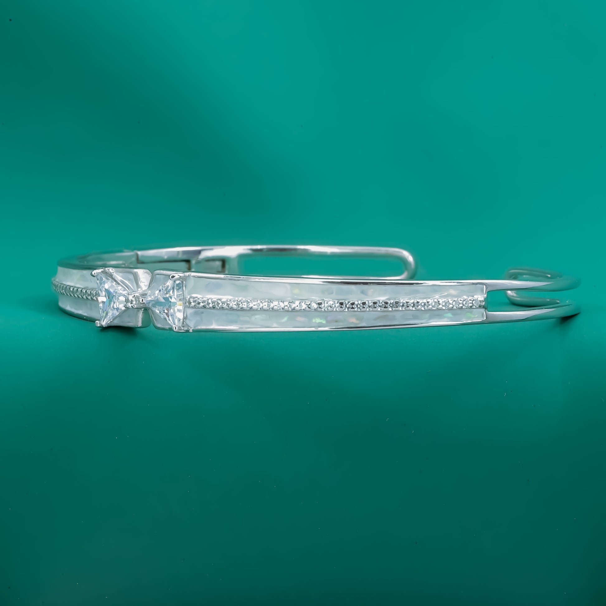 Radiant Bow-Twist Bangle – Sterling Silver Cuff Bracelet - Zentara Jewels